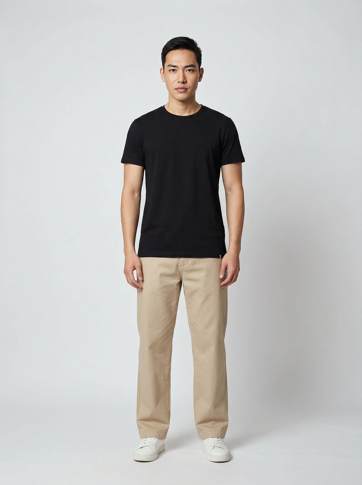 Black cotton T-shirt, full-body worn view – ERVERTE Paris